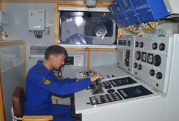 Cadet at a control console