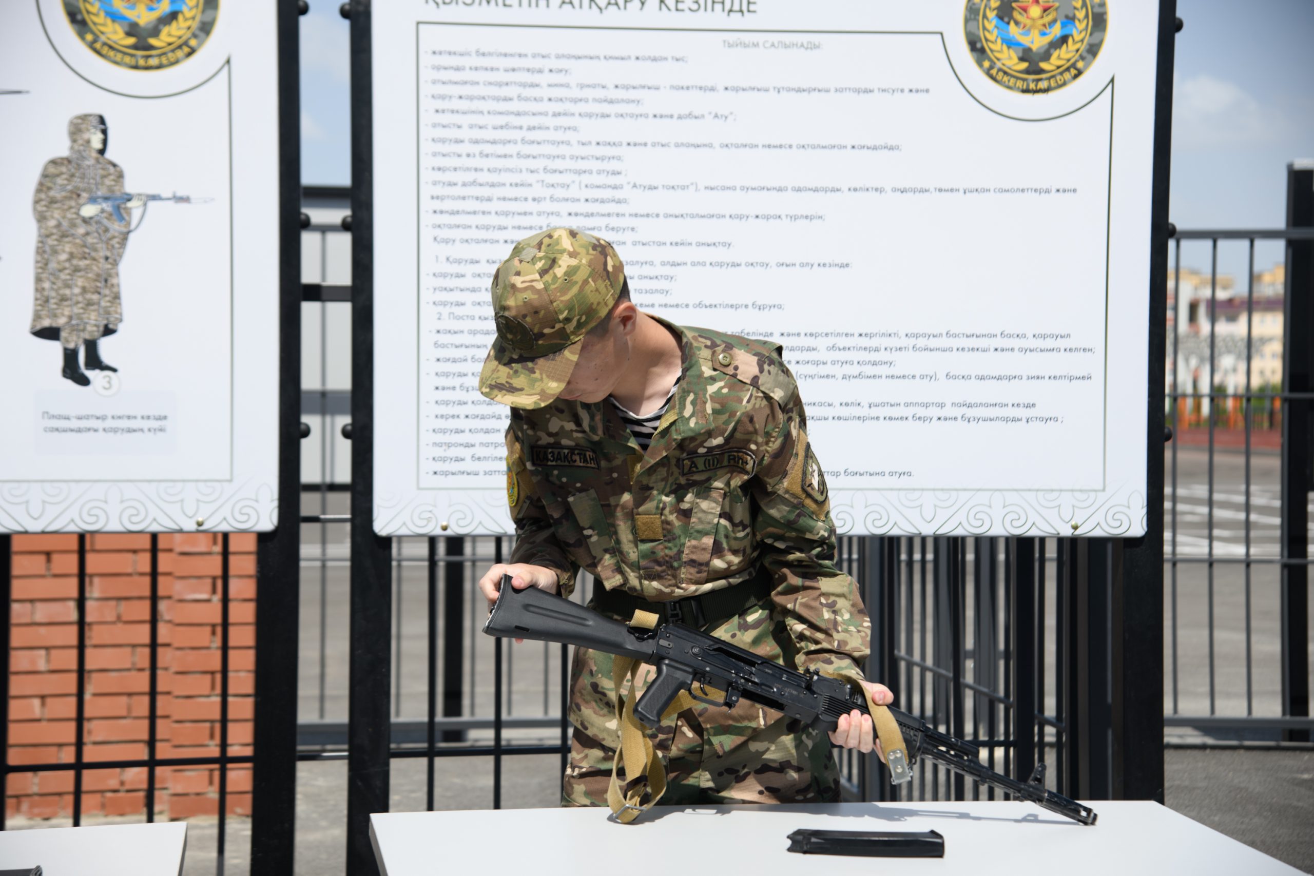 Disassembling a rifle at a training stand