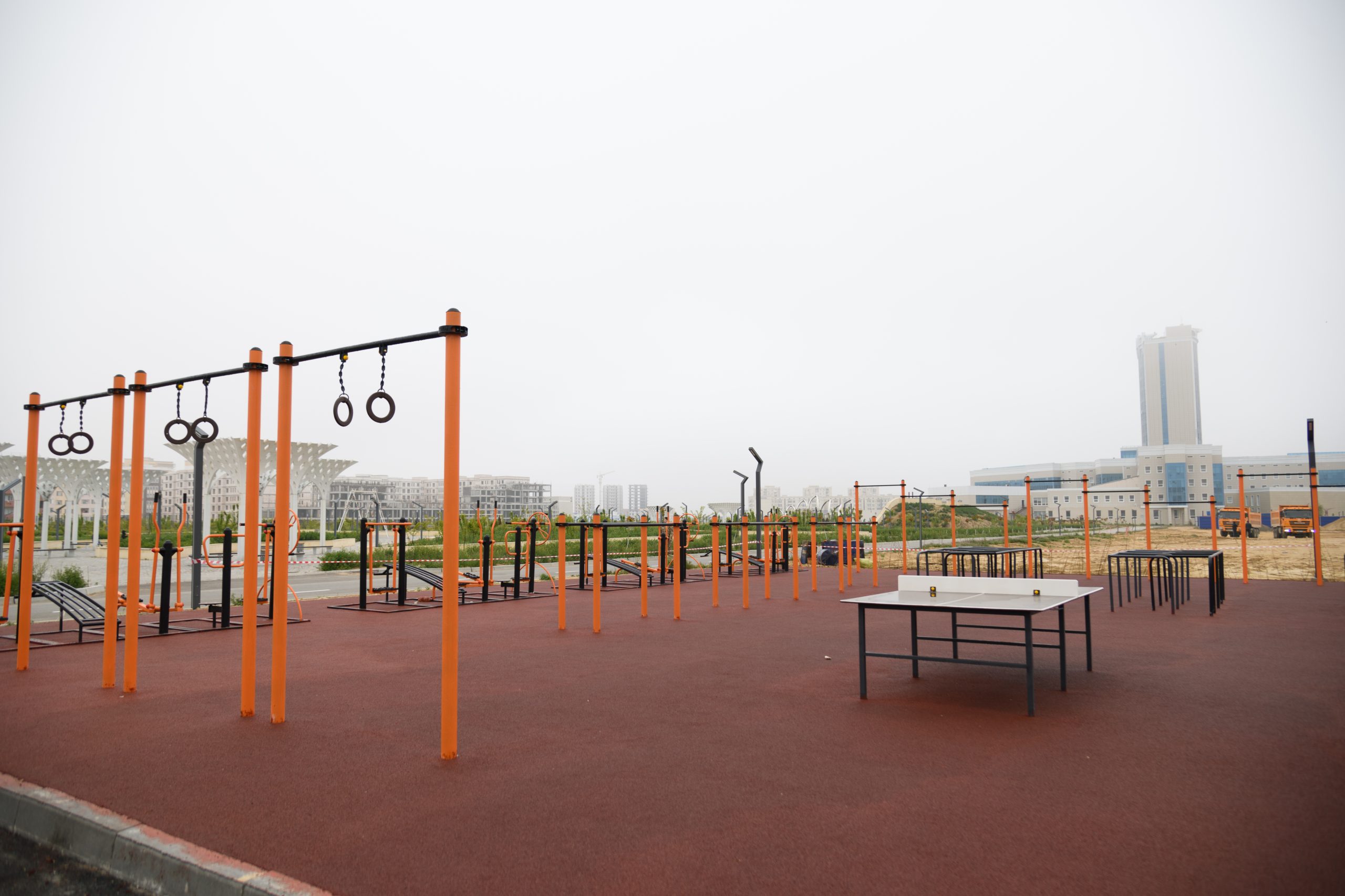 Sports ground with pull-up bars